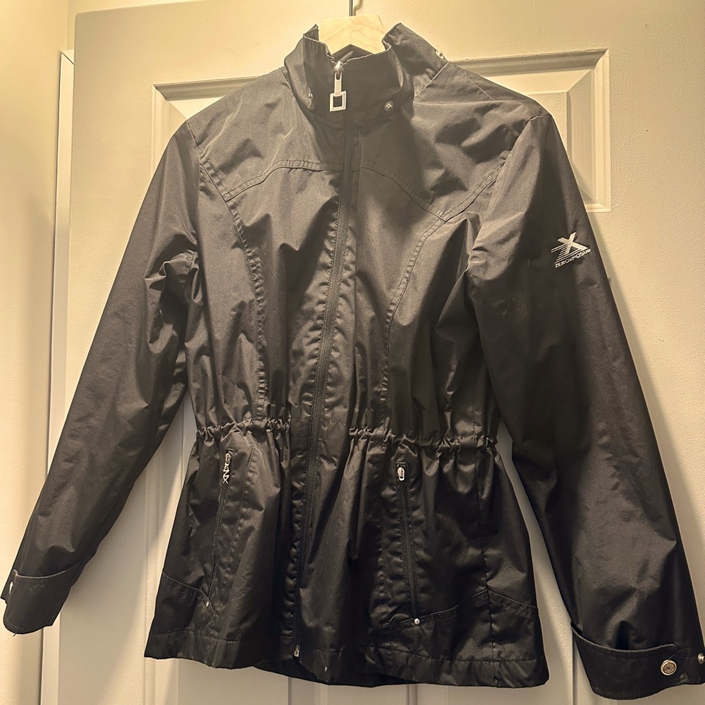 Women’s small black jacket with removable hood and cinched waist.